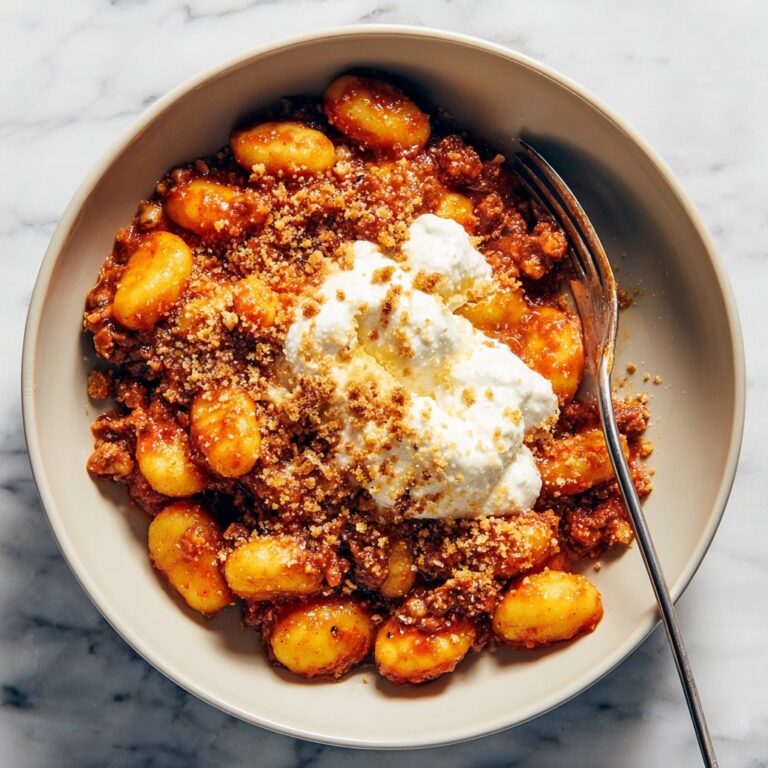 Millionaire Gnocchi with Red Sauce, Herbed Ricotta, and Golden Crispies Recipe