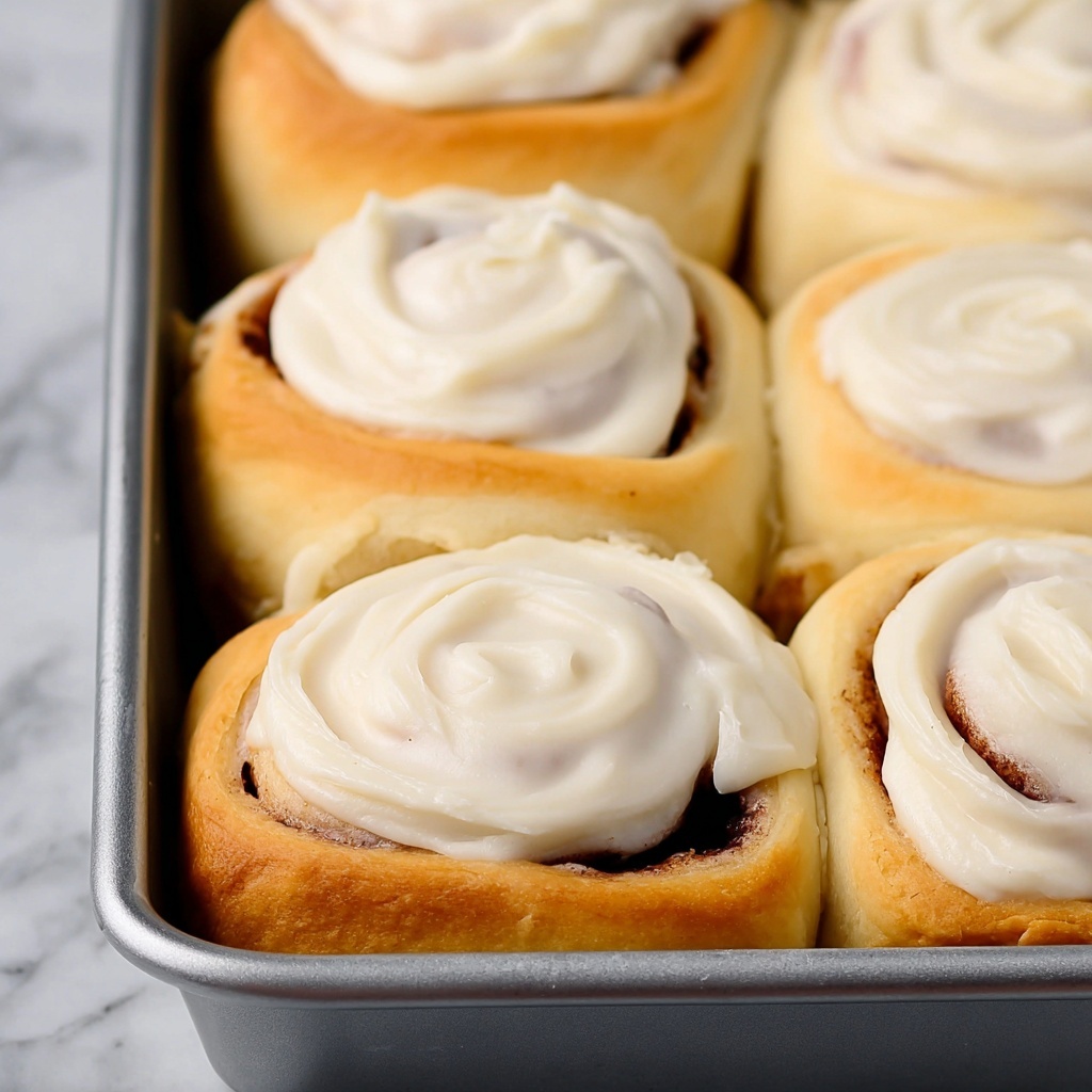 Homemade Cinnamon Rolls with Maple Cream Cheese Frosting Recipe - Recipe Image