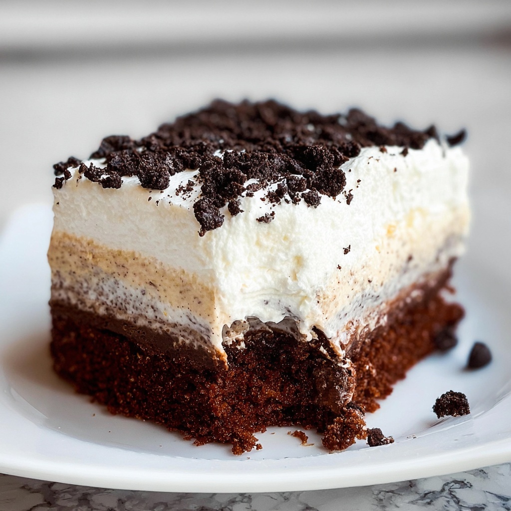 Oreo Pudding Poke Cake Recipe - Recipe Image