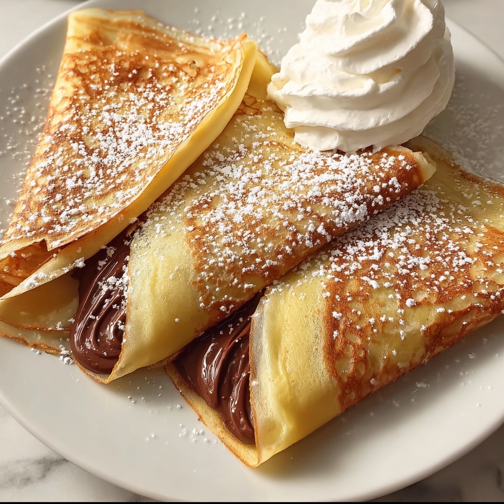 Nutella Stuffed Crepes: 7 Indulgent Tips to Bliss Recipe - Recipe Image